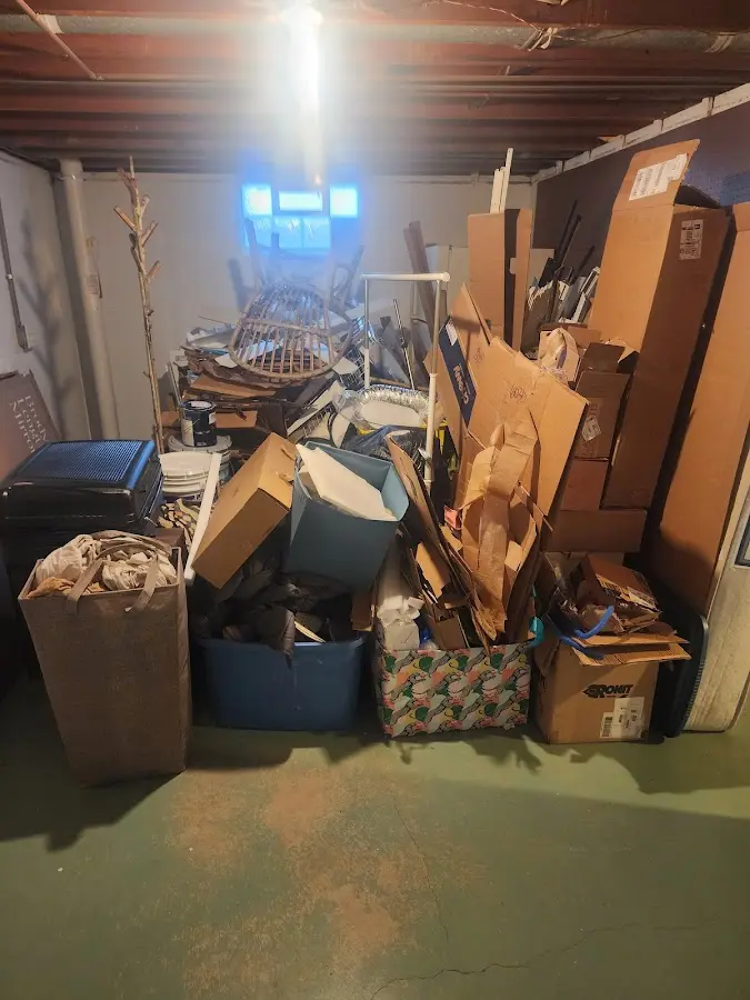 Roll-off dumpster container at job site for Cleanout Dumpster Rental in Burlington